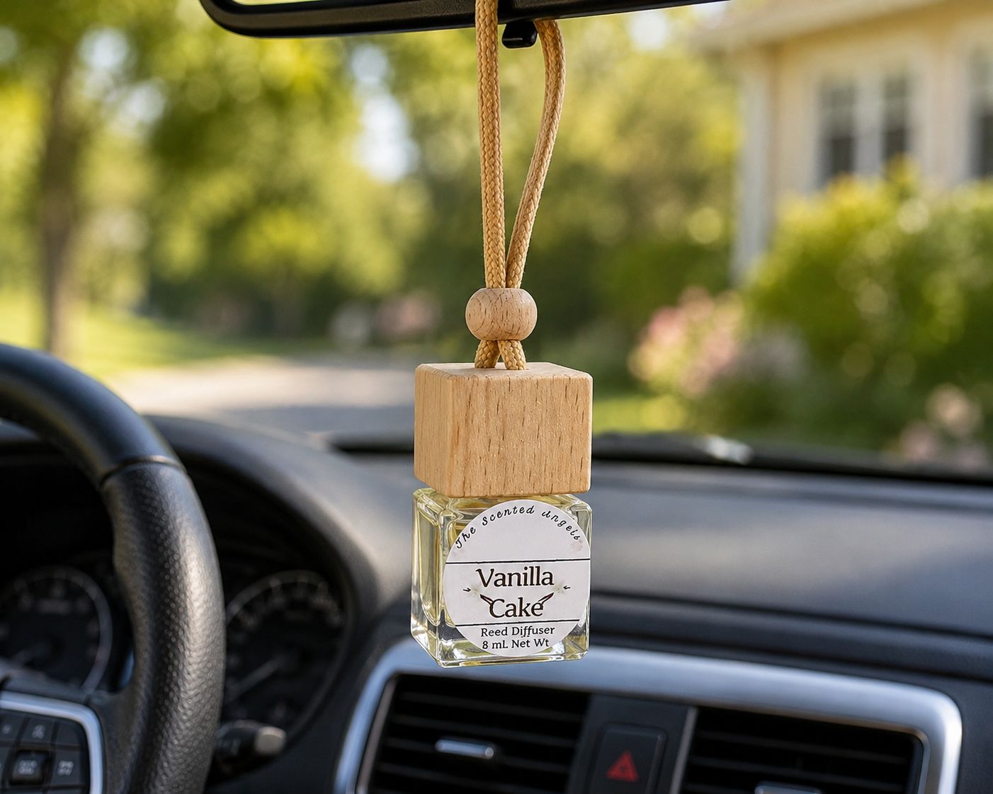 Vanilla Cake handmade hanging car diffuser by The Scented Angels featuring the warm bakery fragrance of buttercream, vanilla, and fresh cake in a premium hanging glass diffuser.